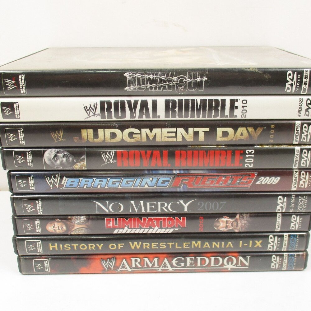 9 WWE DVD Lot Wrestlemania I-IX, Royal Rumble, No Way Out, The Rock, Triple H
